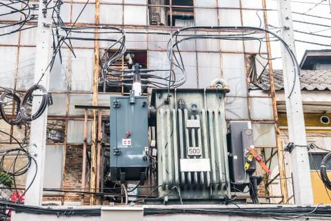 Old transformer on electrict pole Stock Photos