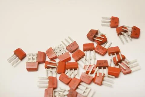 Old transistors on a white background. Electronic elements. Stock Photos