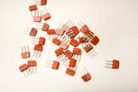 Old transistors on a white background. Electronic elements. Stock Photos