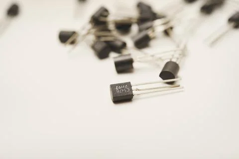 Old transistors on a white background. Electronic elements. Stock Photos
