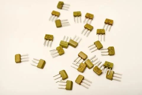 Old transistors on a white background. Electronic elements. Stock Photos
