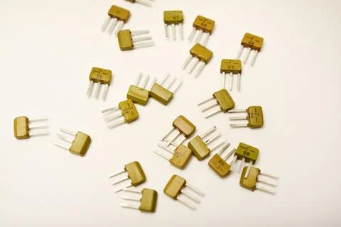 Old transistors on a white background. Electronic elements. Stock Photos