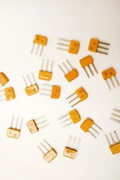 Old transistors on a white background. Electronic elements. Stock Photos
