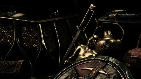 Old treasures and a sword on a table with a dark background Stock Footage 344825362