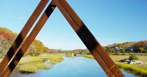 Old Trolly Bridge with a train in the background at Stony Creek, Connecticut. Stock Footage 73334976