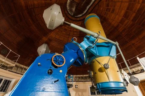 Old trophy large optical telescope Stock Photos