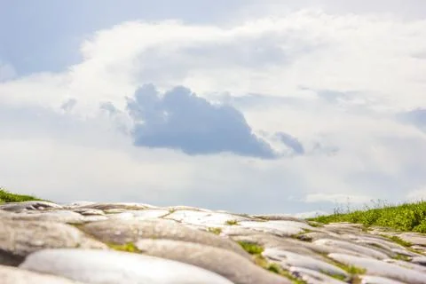 Old turkey paving with sky clouds above Stock Photos