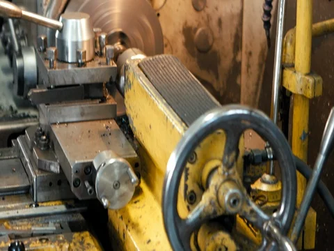 Old turning lathe machine in turning workshop Stock Footage 77946164
