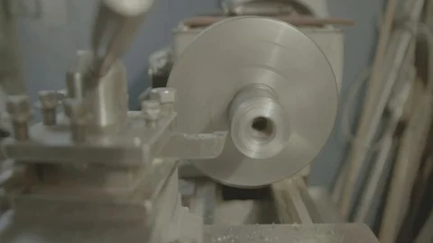 Old turning lathe machine in turning workshop. Turning machine cutting tool Stock Footage 89613575