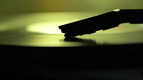Old Turntable With Stylus Running Along Vinyl CD Playing Music Video stock 140989688