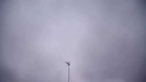 Old TV antenna on a cloudy sky in 4k Stock-Footage 130183418