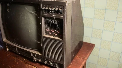 Old TV in cobweb, side view Stock Footage 138399853