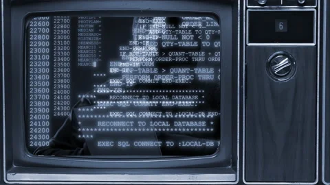 Old tv with Computer program codes running  on screen Video stock 150991366