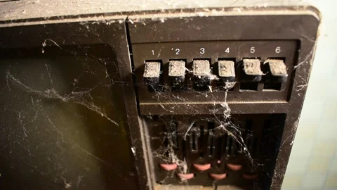 Old TV control buttons in dust and cobwebs Stock Footage 138400026