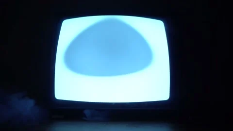 Old TV with Glitch screen and smoke, low point of view, wide lens shot. Stock Footage 149846314