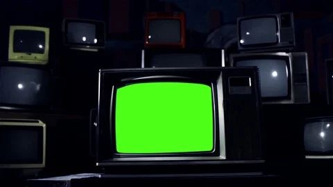 Old TV Green Screen and Many Retro TVs. Blue Steel Tone. Stock Footage 87842079