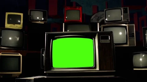 Old Tv with Green Screen In The Middle Of Many Tvs. Aesthetics of the 80s. Stock-Footage 87842085