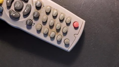 Old the TV remote control is on the table Stock Photos