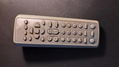 Old the TV remote control is on the table Stock Photos