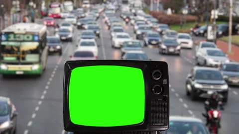 Old TV Turning On Green Screen with a Busy Street and Traffic in the Background. Stock Footage 252101136