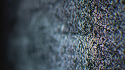 Old tv White noise loop in very shallow depth of field Stock Footage 97407955