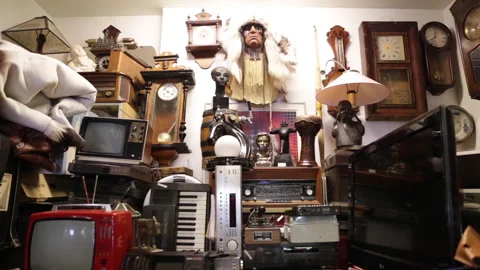 Old TV's and clocks in thrift store, vintage shop, charity Stock Footage 143482690