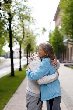 Old Two Humans Feeling n Love Wearing Sportswear While Embracing Hugging Each Stock Photos
