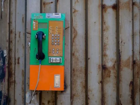 The Old type using coin Phone, retro and rusty Foto stock