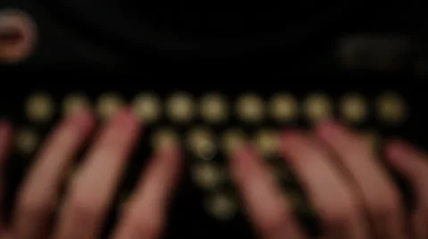 Old typewriter jib up and down defocus with hands Stock Footage 47383226