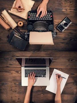 Old typewriter with laptop, concept of technology progress Stock-Fotos
