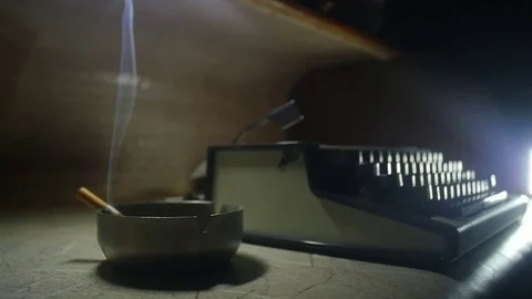 Old typewriter [Noir setting] cigar smoke slowmotion Stock Footage 69075731