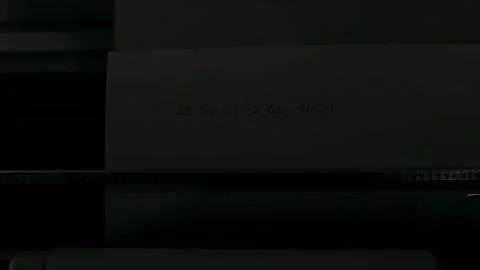An old typewriter with a sheet of paper and a line of words Stock Footage 318162790
