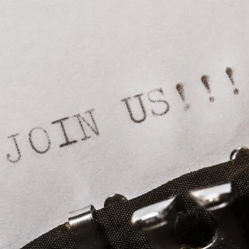 Old typewriter with text join us Stock Photos