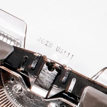 Old typewriter with text join us Stock Photos