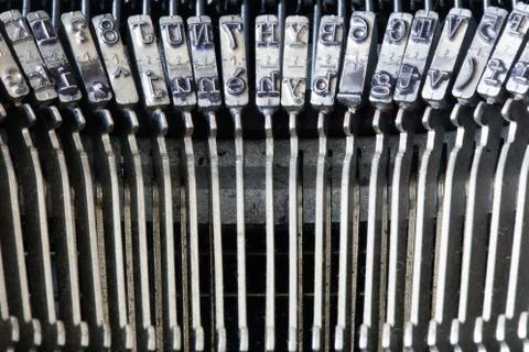 Old typewriter typebars close up Stock Photos