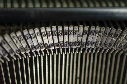 Old typewriter typebars in focus Stock Photos