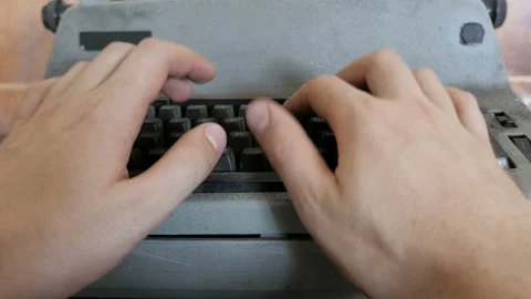 Old typewriter typing. Vintage typewriter being used by male hands Stock Footage 95264533