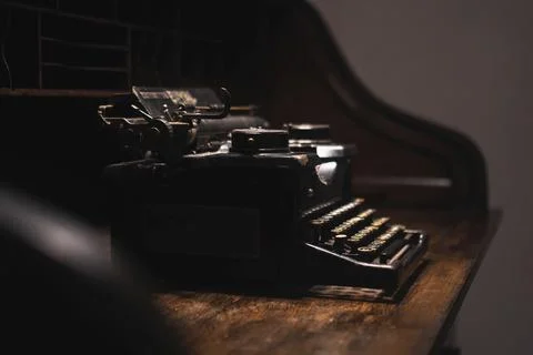 Old typewriter on a wooden table Stock Photos