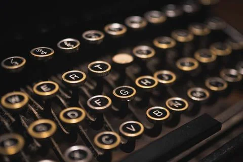 Old typewriter on a wooden table Stock Photos