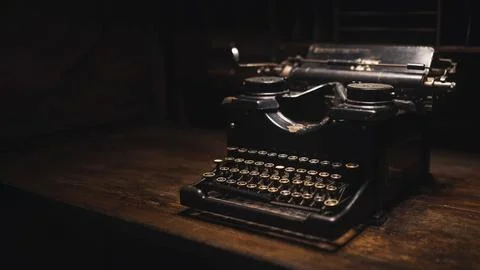 Old typewriter on a wooden table Stock Photos