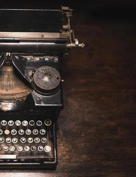 Old typewriter on a wooden table Stock Photos