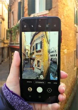 Old typical house through cell phone camera Stock Photos