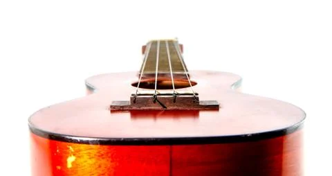 Old ukulele  on white background Stock Photos