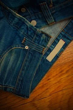 Old unbuttoned jeans Stock Photos
