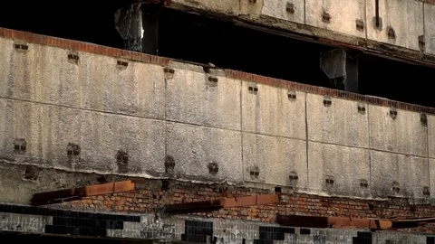 The old unfinished building on the background of sky and crane. the site isn't Stock Footage 92086582