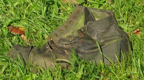 Old, unusable shoes, side view Stock Footage 41833813