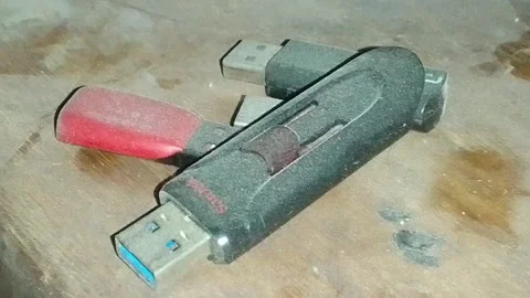 Old Usbs on a dirty tablet full of dust, flash drives Stock Footage 238936037