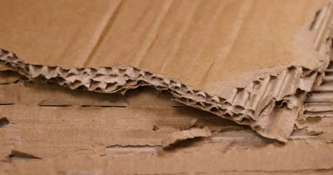 Old used cardboard for packaging items, packaging cardboard from recycled waste Stock Footage 284045860
