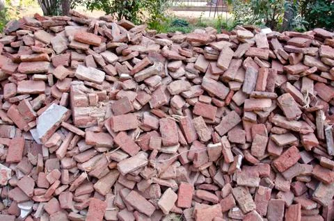 Old used red bricks stack in India Stock Photos