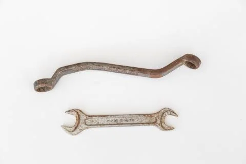 Old used ring spanner and Wrench on a white background Foto stock